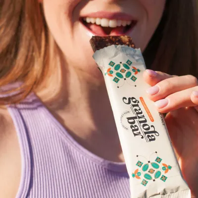 girl is eating a healthy snack after running