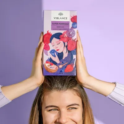 girl with berry porridge